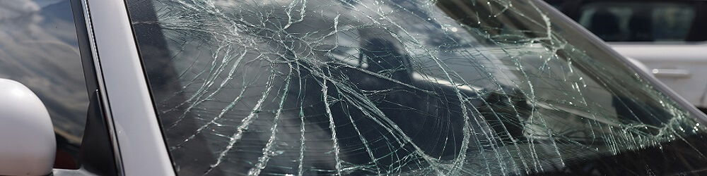 Closeup Of Cracks On Broken Car Windshield